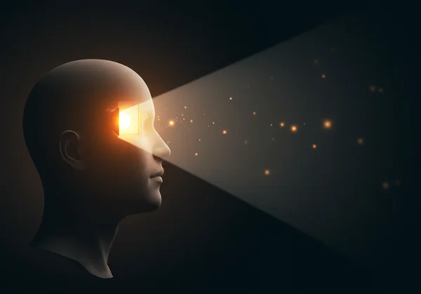 A person's head with a spotlight shining on a specific area